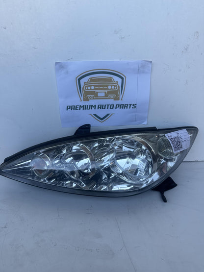2004  V30 Left Headlight