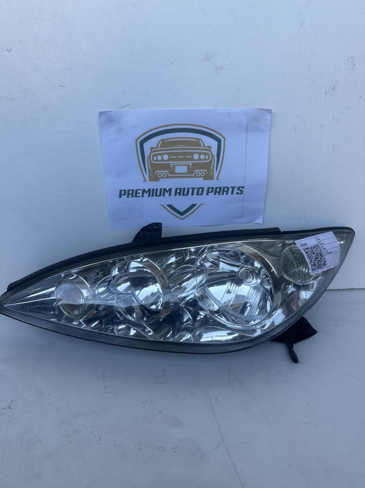 2004  V30 Left Headlight