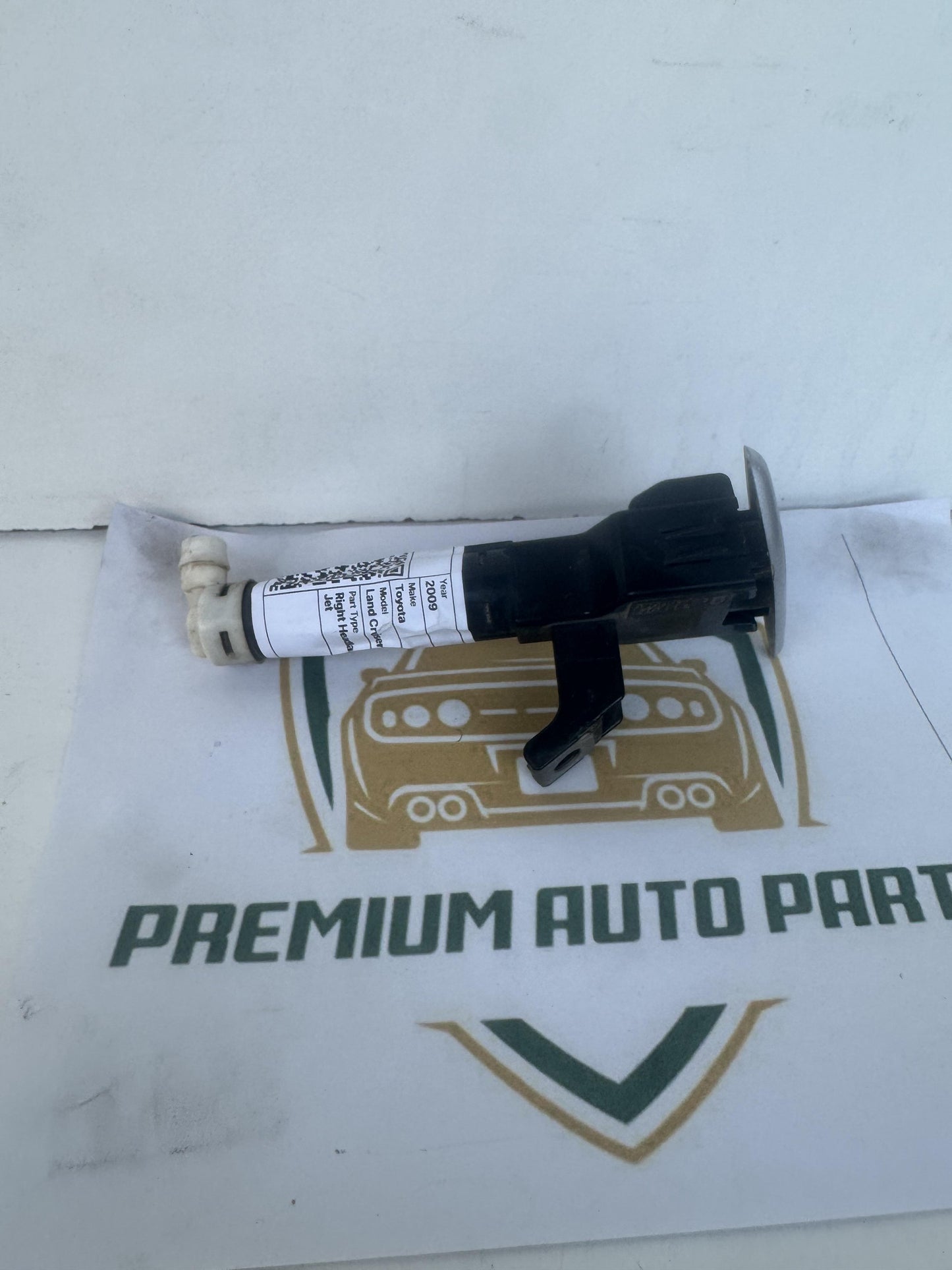 2009  J150 Right Headlight Washer Jet