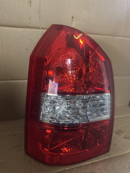 2008  JM Left Taillight