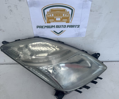 2006  W20 Right Headlight