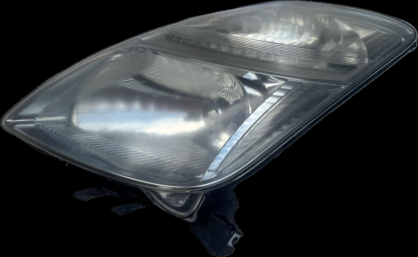 2006  W20 Left Headlight