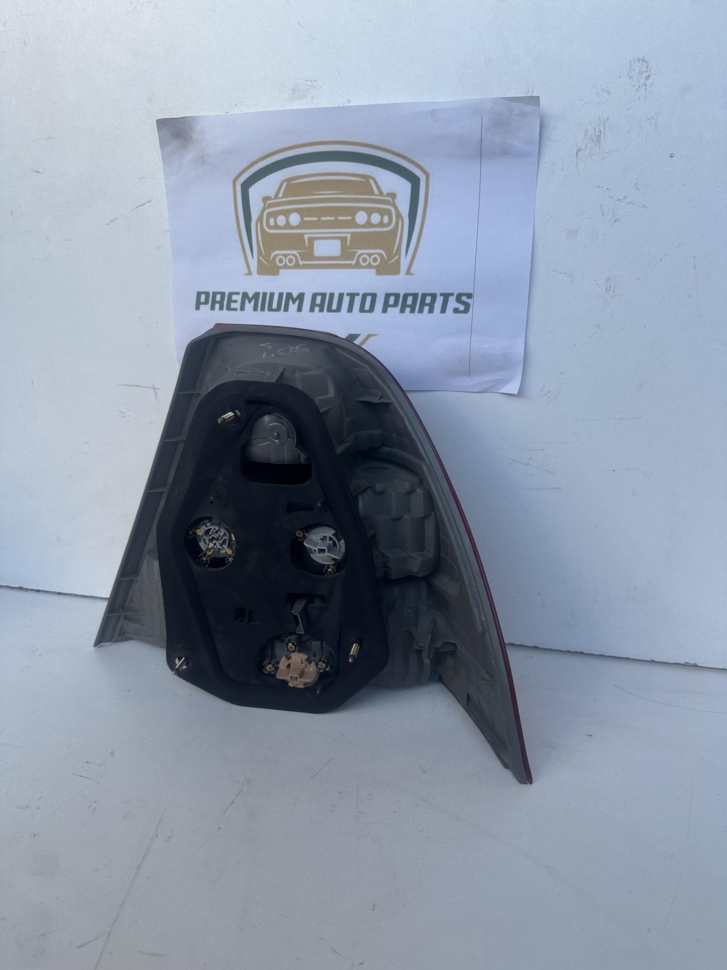 2003  E120 Left Taillight