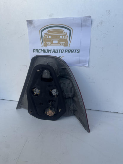 2003  E120 Left Taillight