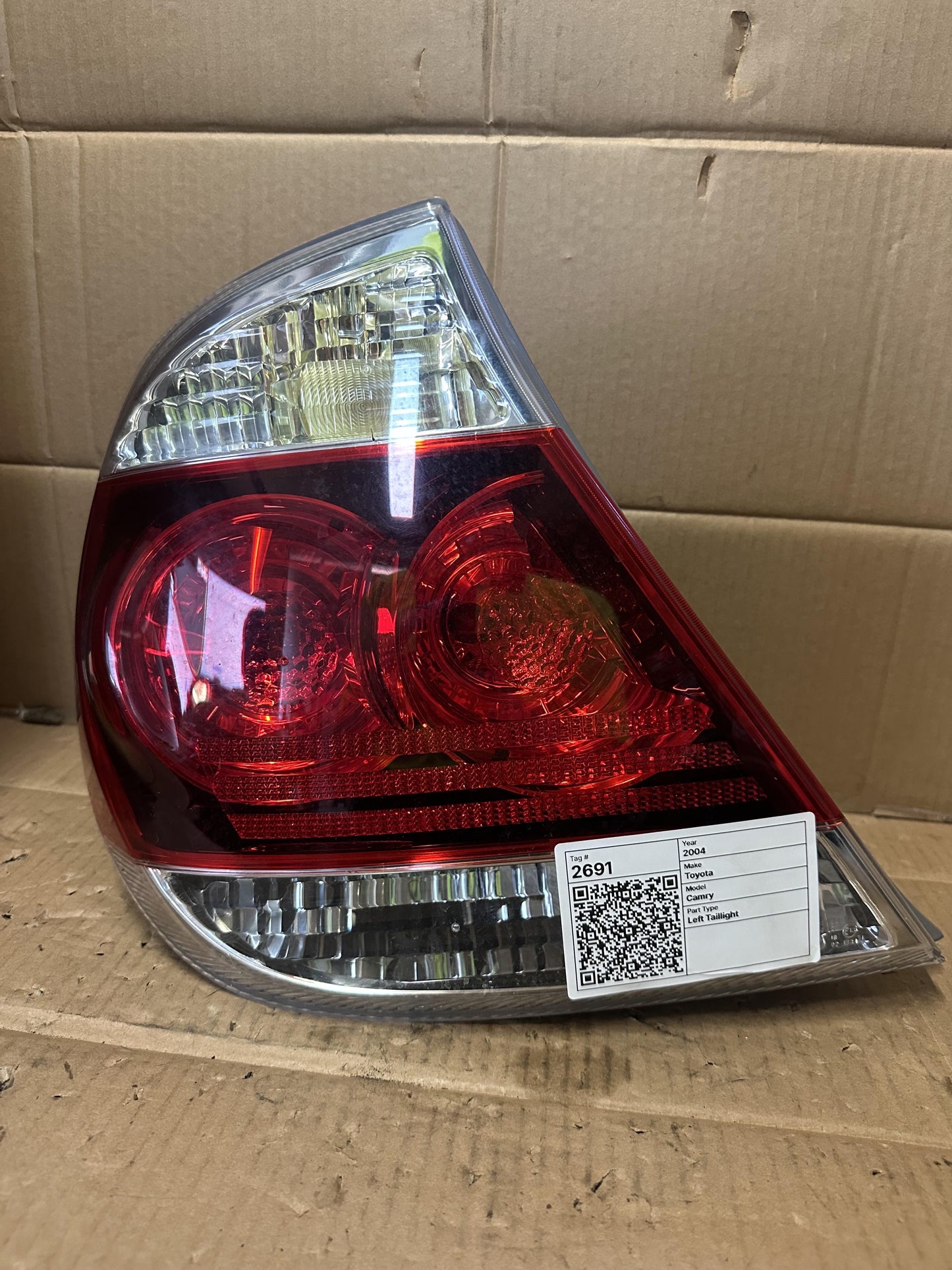 2004  Sportivo Left Taillight