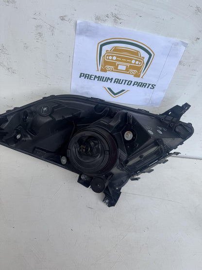 2006  W20 Left Headlight