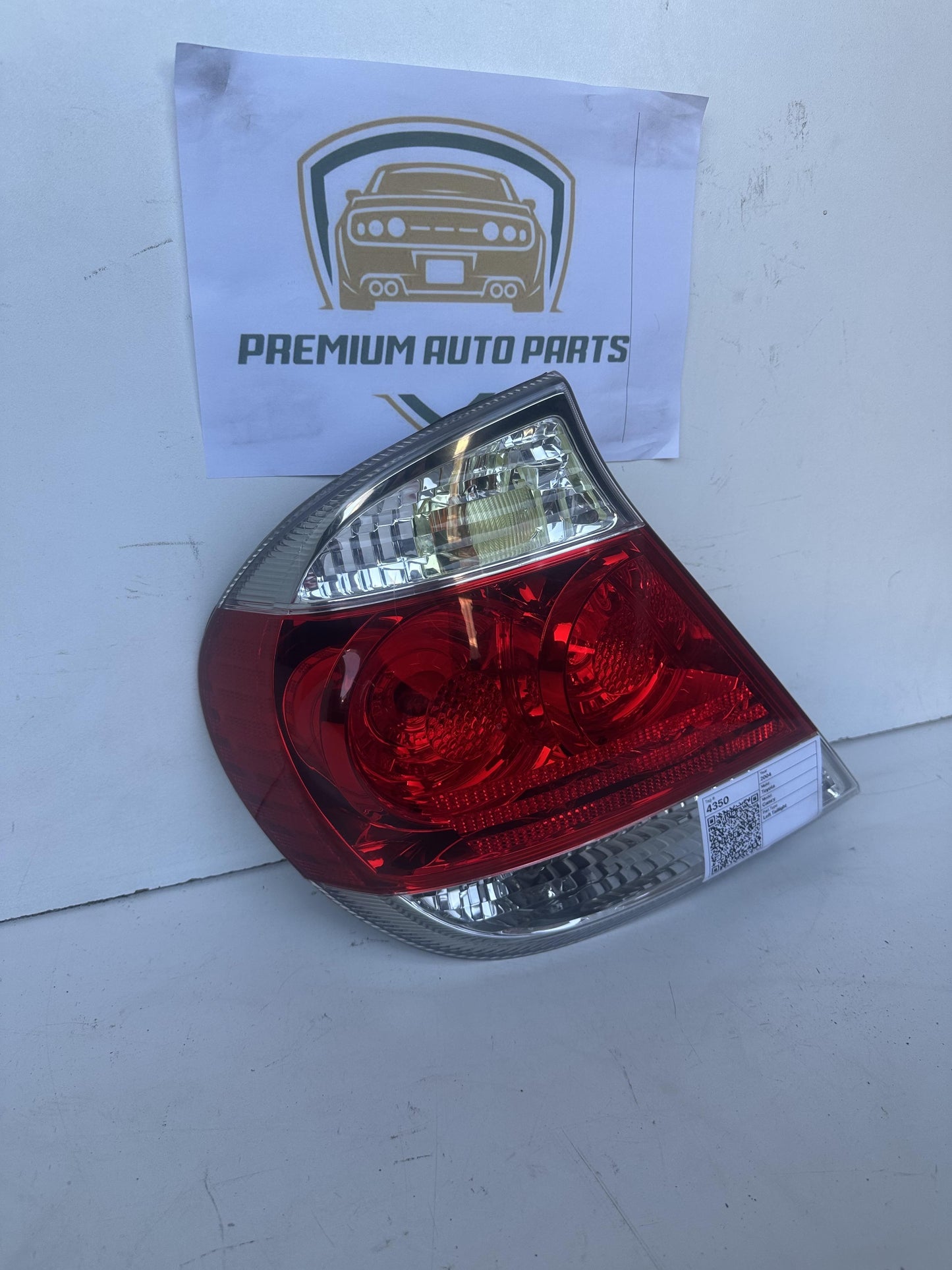 2004  V30 Left Taillight