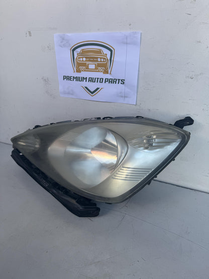 2009   Left Headlight