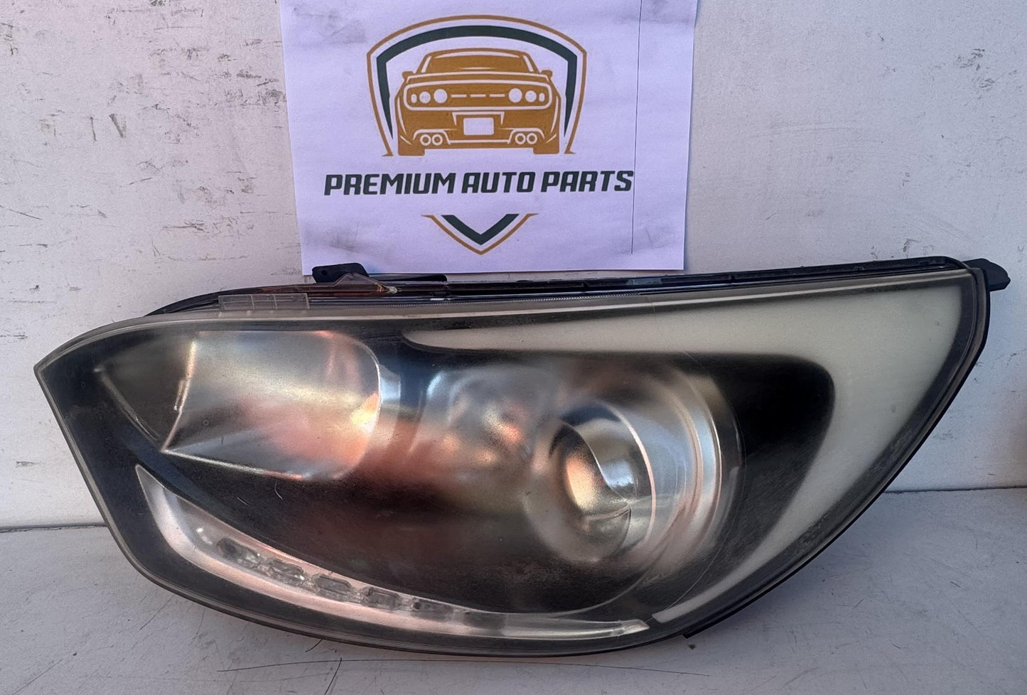 2013  UB Left Headlight