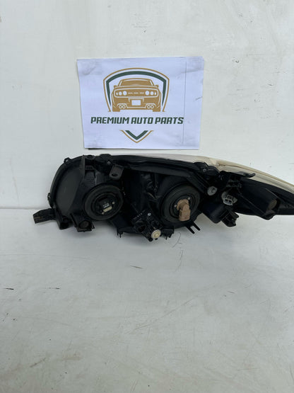 2008  E150 Right Headlight