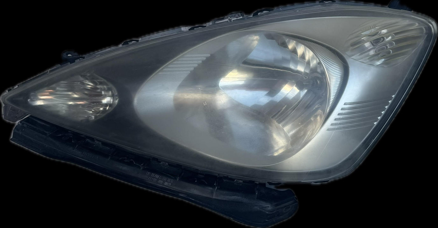 2009   Left Headlight