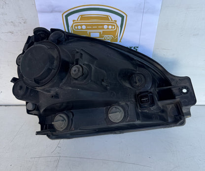 2009  JM Left Headlight