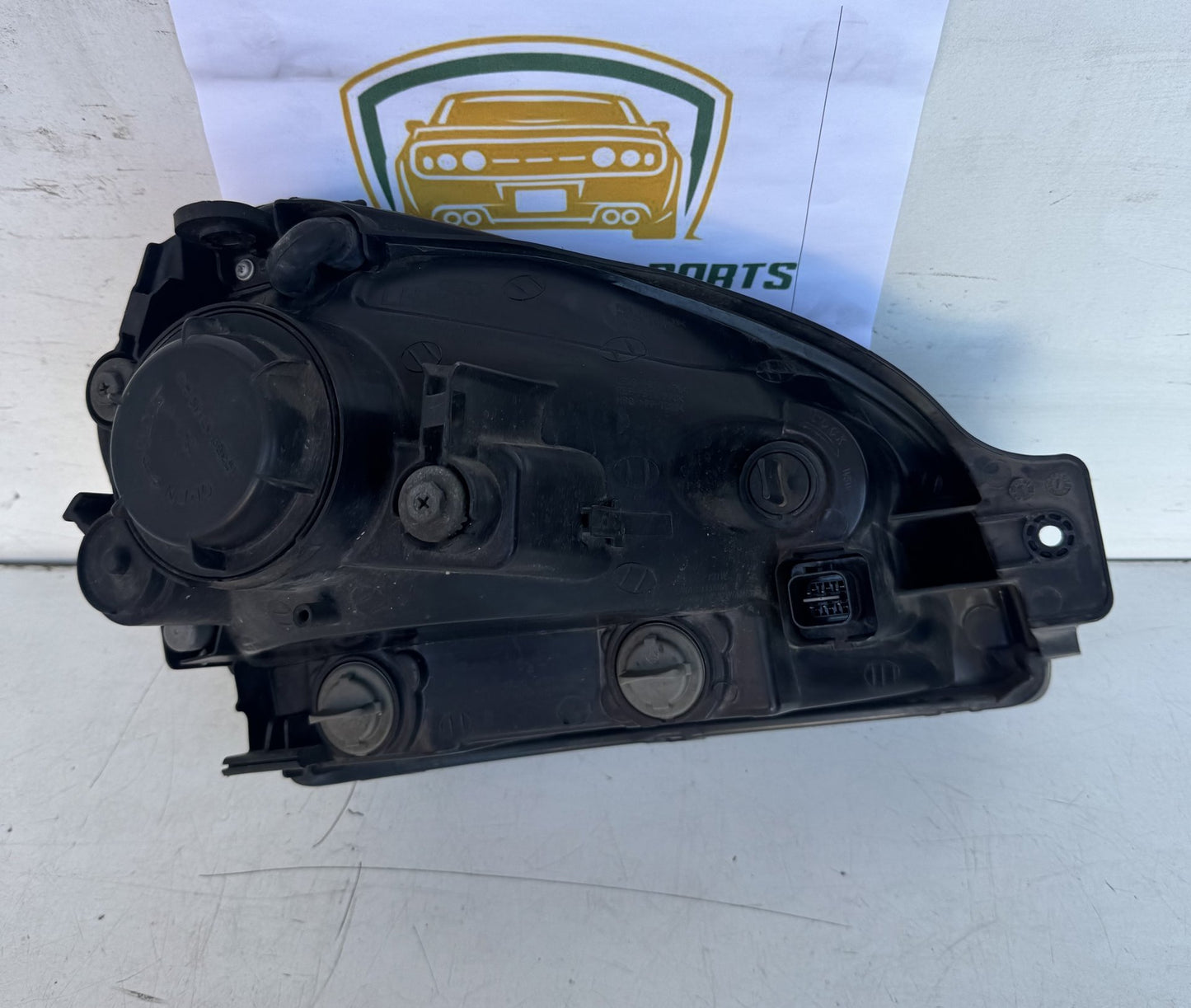 2009  JM Left Headlight