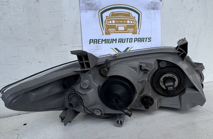 2010  XV40 Left Headlight