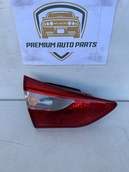 2014  GD Left Bootlid Light