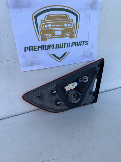 2014  GD Left Bootlid Light