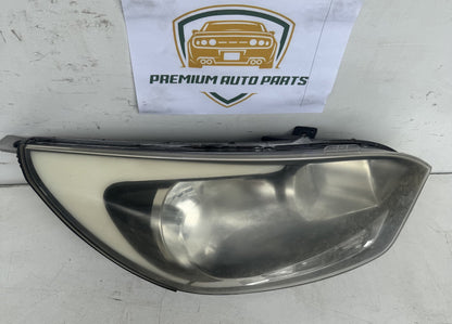 2014  UB Right Headlight