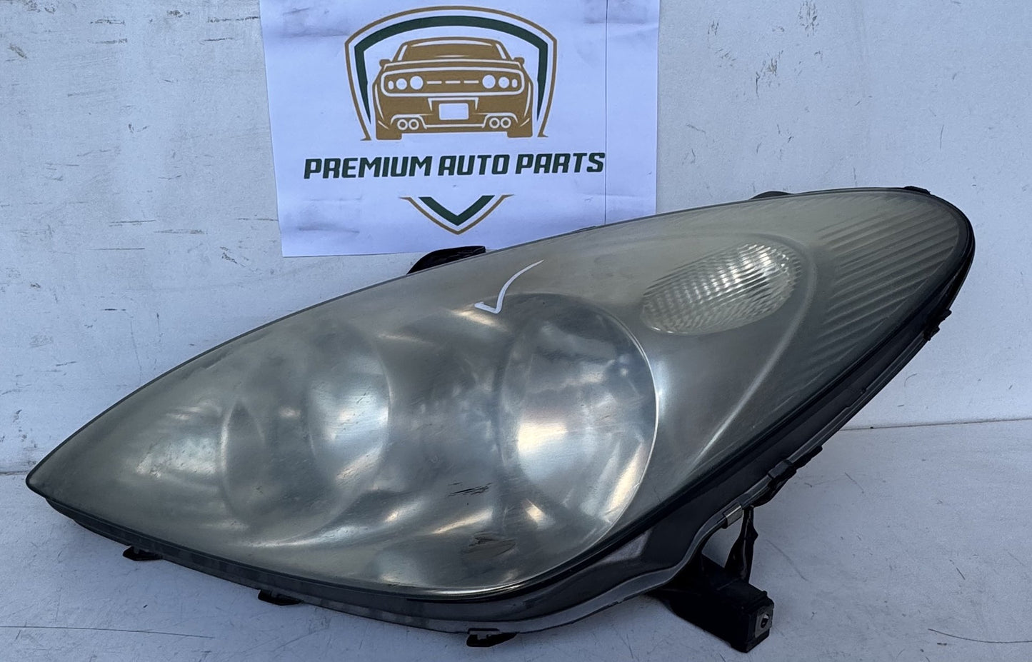 2003   Left Headlight
