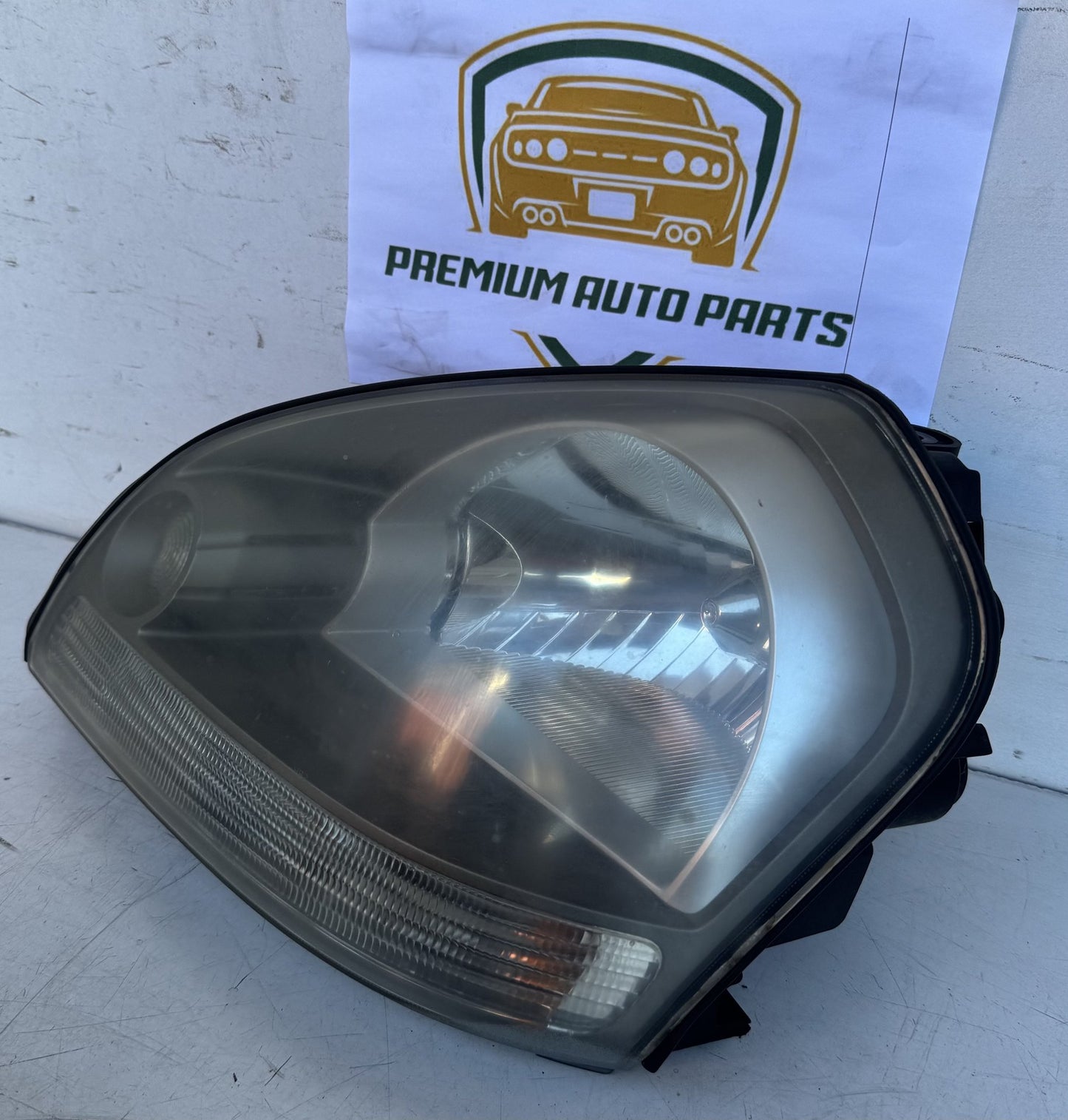 2009  JM Left Headlight