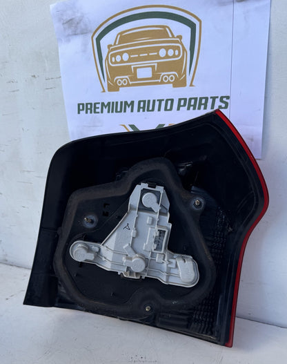 2004  E120 Left Taillight