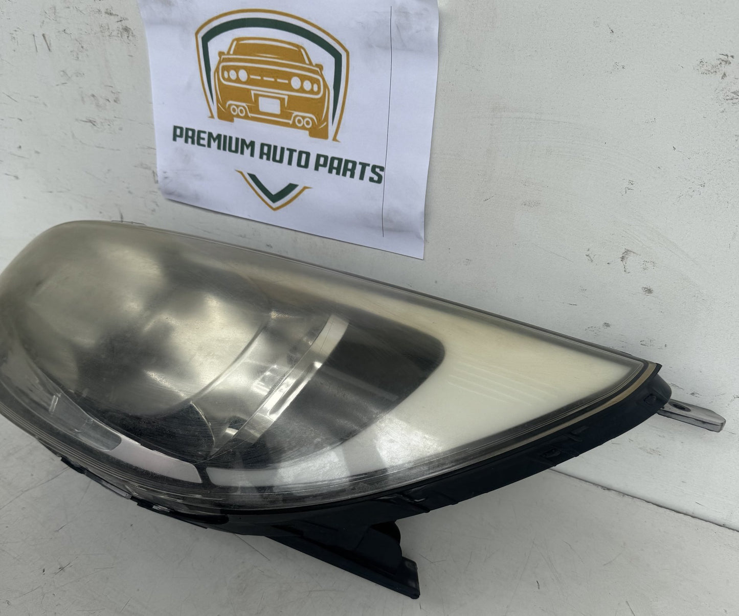 2014  UB Left Headlight