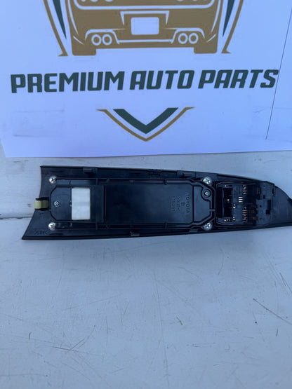 2010  E20 Master Power Window Switch