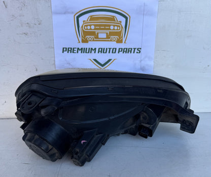 2009  JM Left Headlight