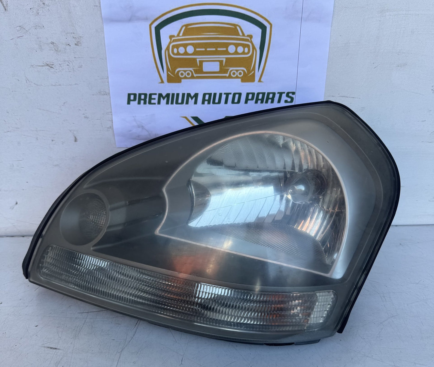 2009  JM Left Headlight