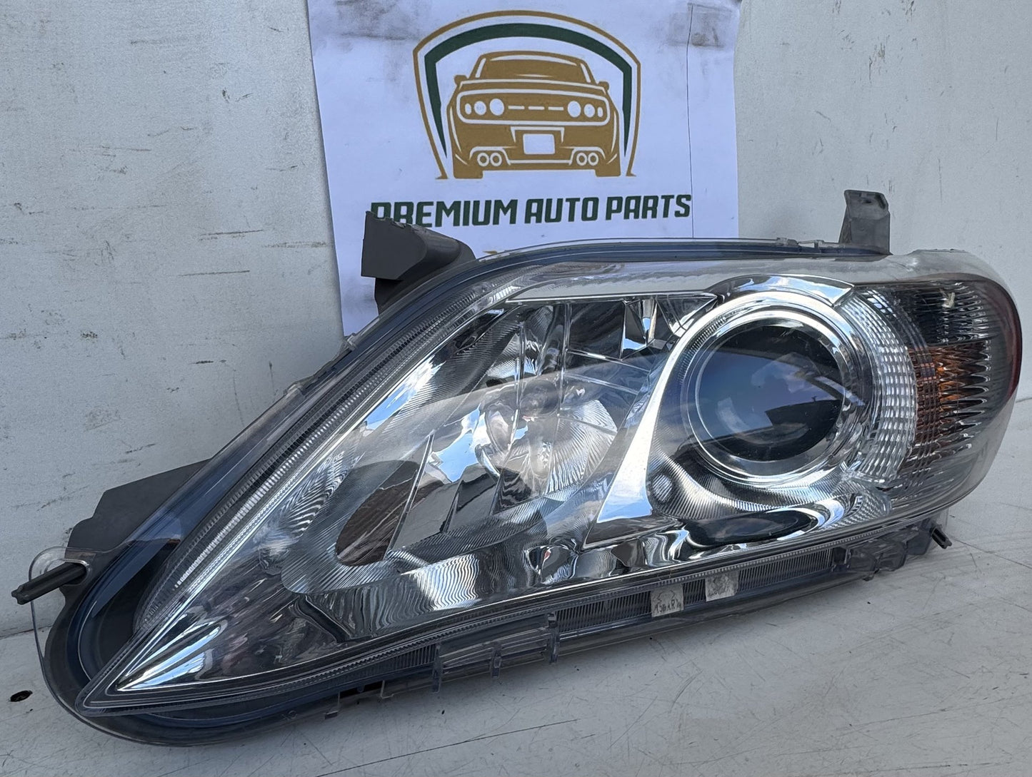 2010  XV40 Left Headlight