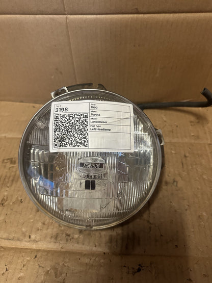 1990 Toyota Land Cruiser - Left Headlight