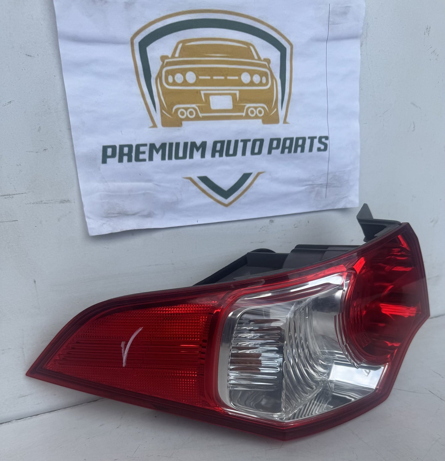 2009  CU Left Taillight