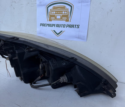 2003   Left Headlight