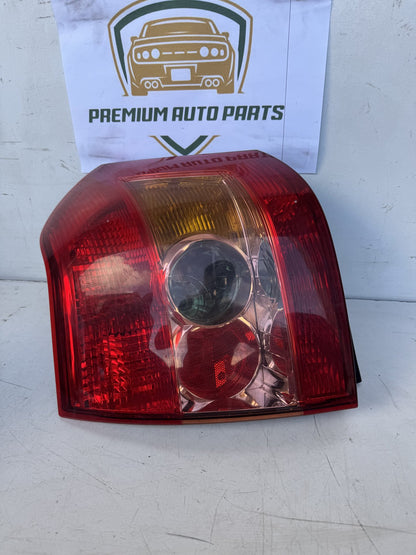 2004  E120 Left Taillight
