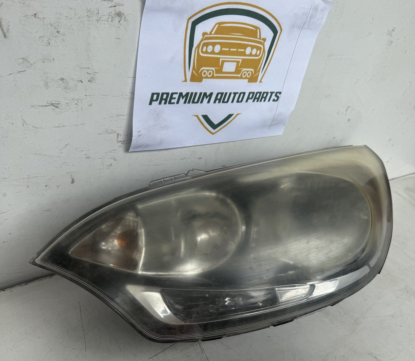 2014  UB Left Headlight