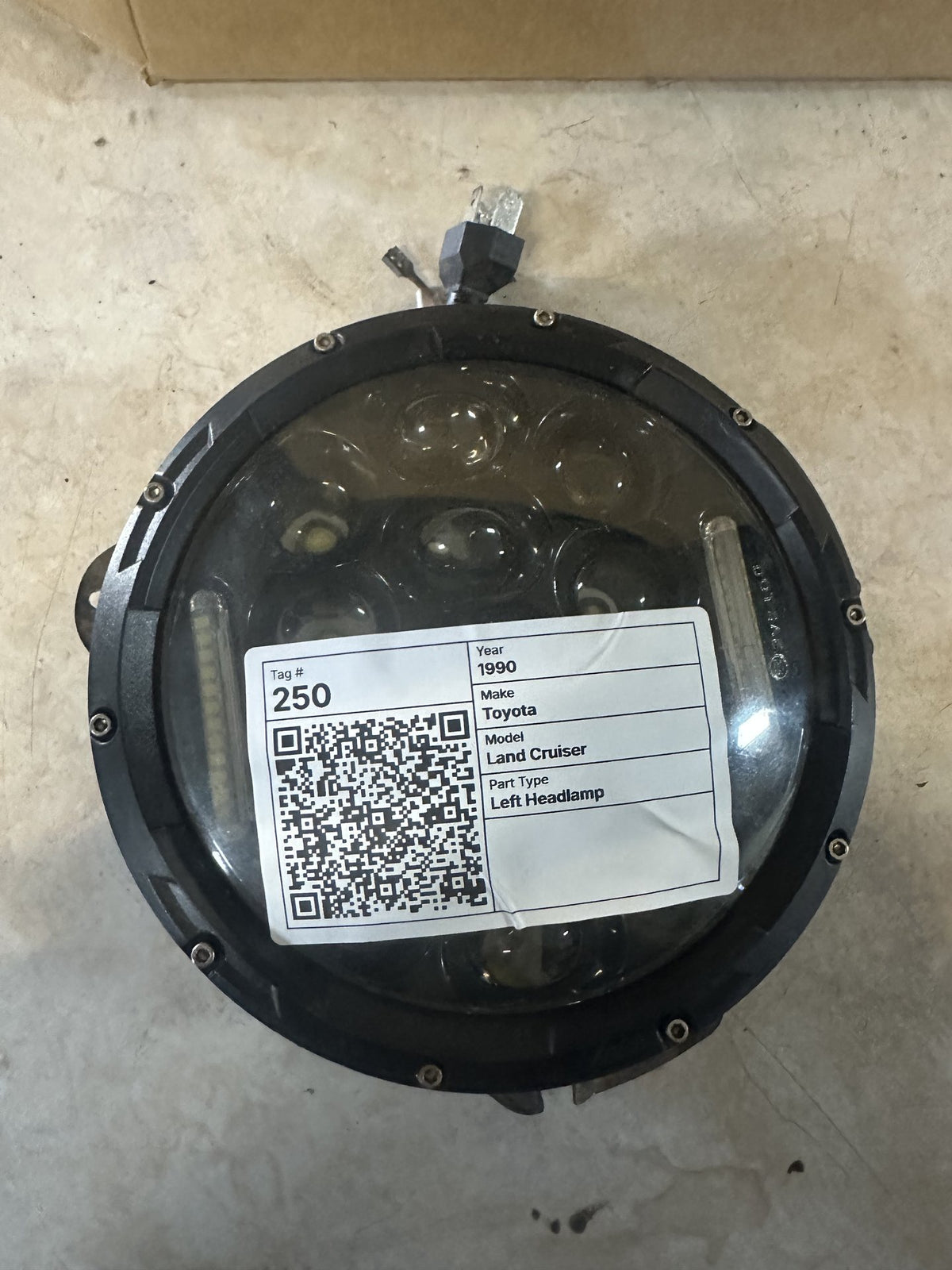 1990 Toyota Land Cruiser - Left Headlight