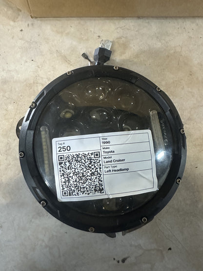 1990 Toyota Land Cruiser - Left Headlight