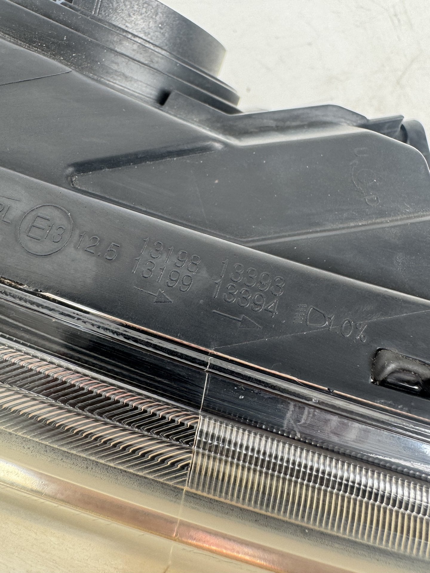 2014  UB Left Headlight
