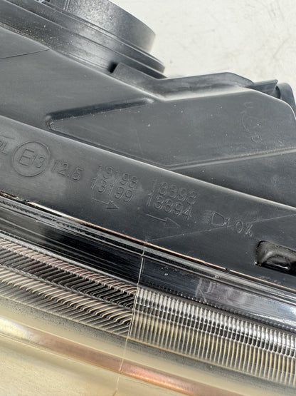 2014  UB Left Headlight