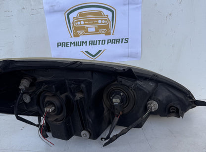 2003   Left Headlight