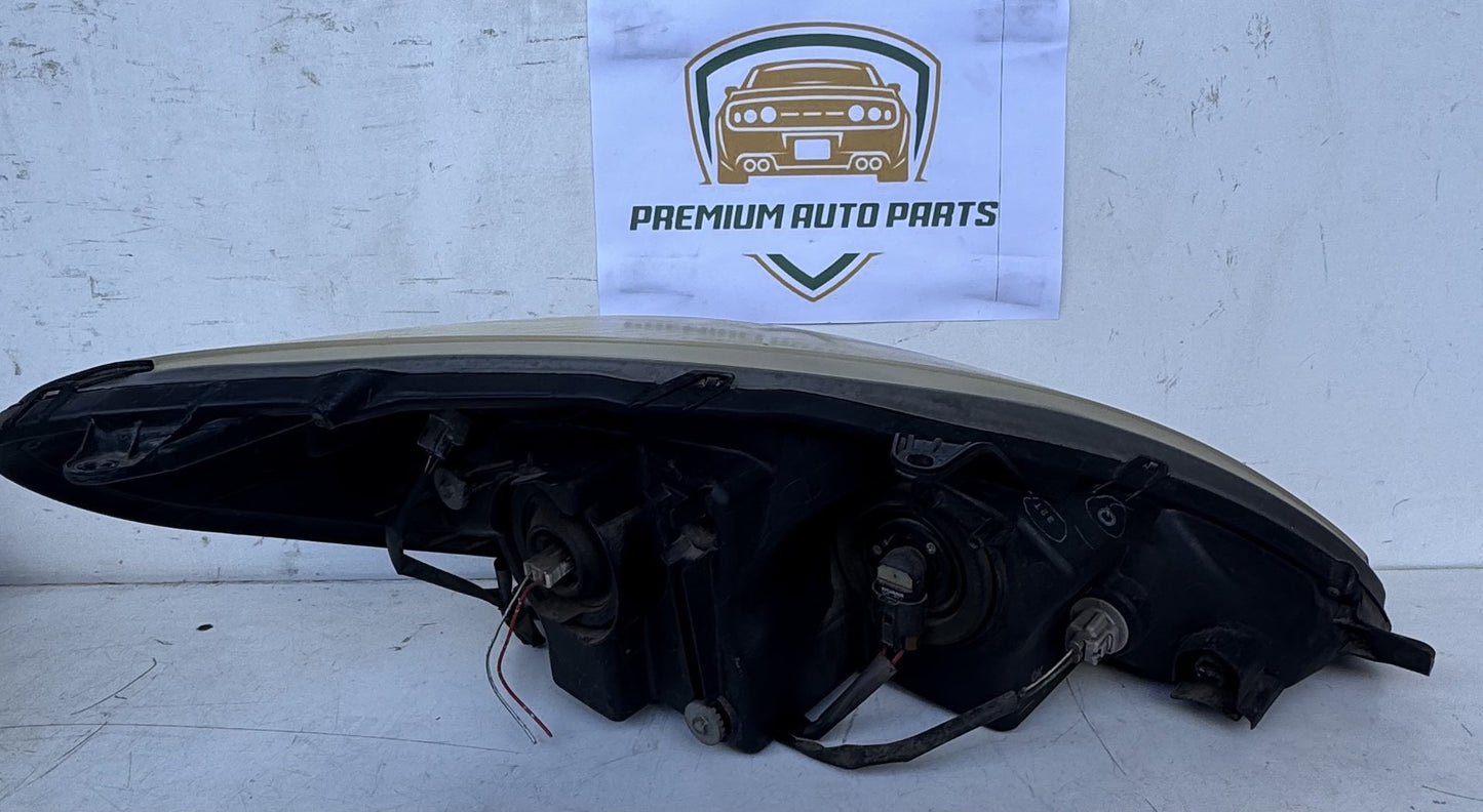 2003   Left Headlight