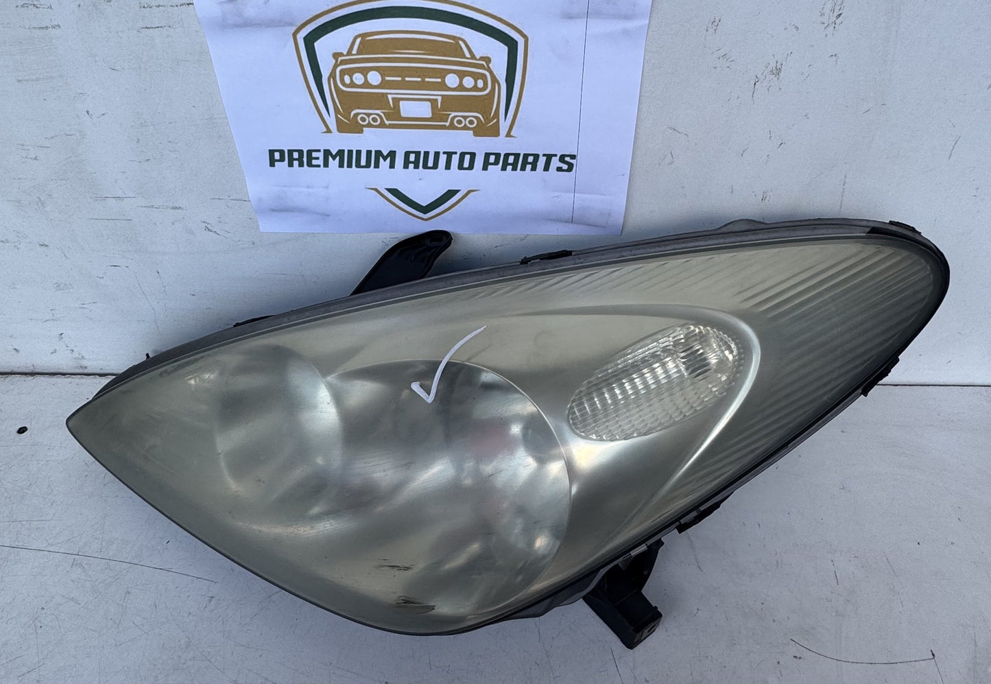 2003   Left Headlight