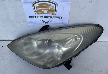 2003   Left Headlight