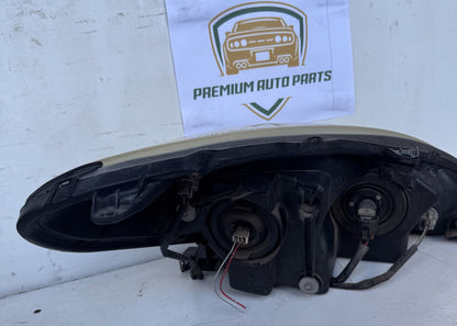 2003   Left Headlight