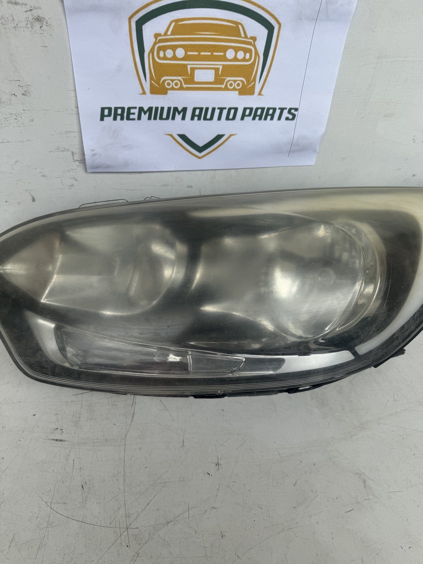 2014  UB Left Headlight