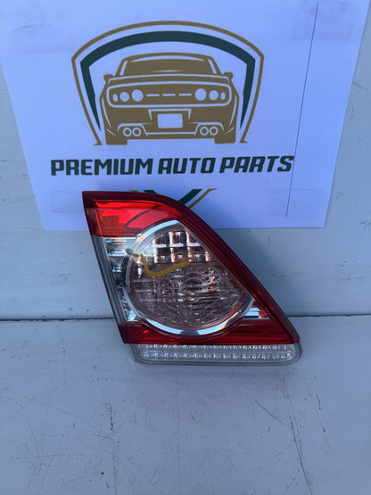 2010  E150 Left Bootlid Light