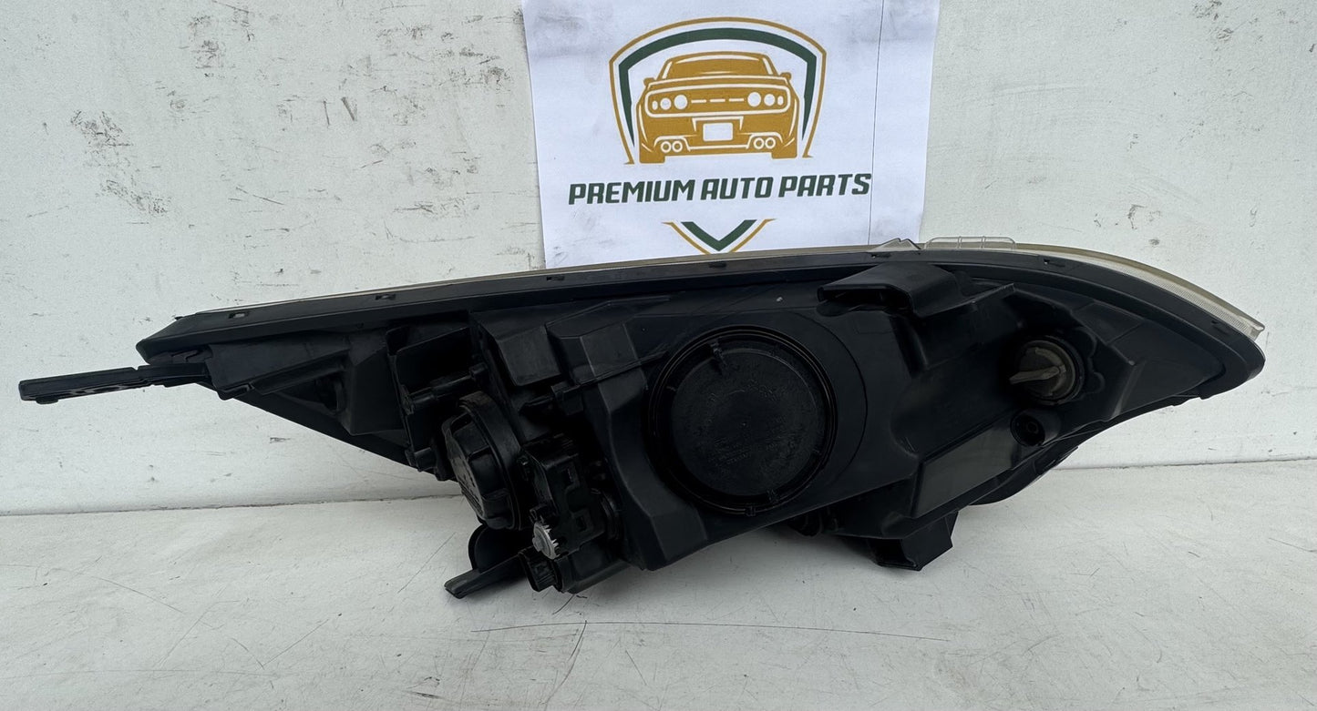 2014  UB Left Headlight