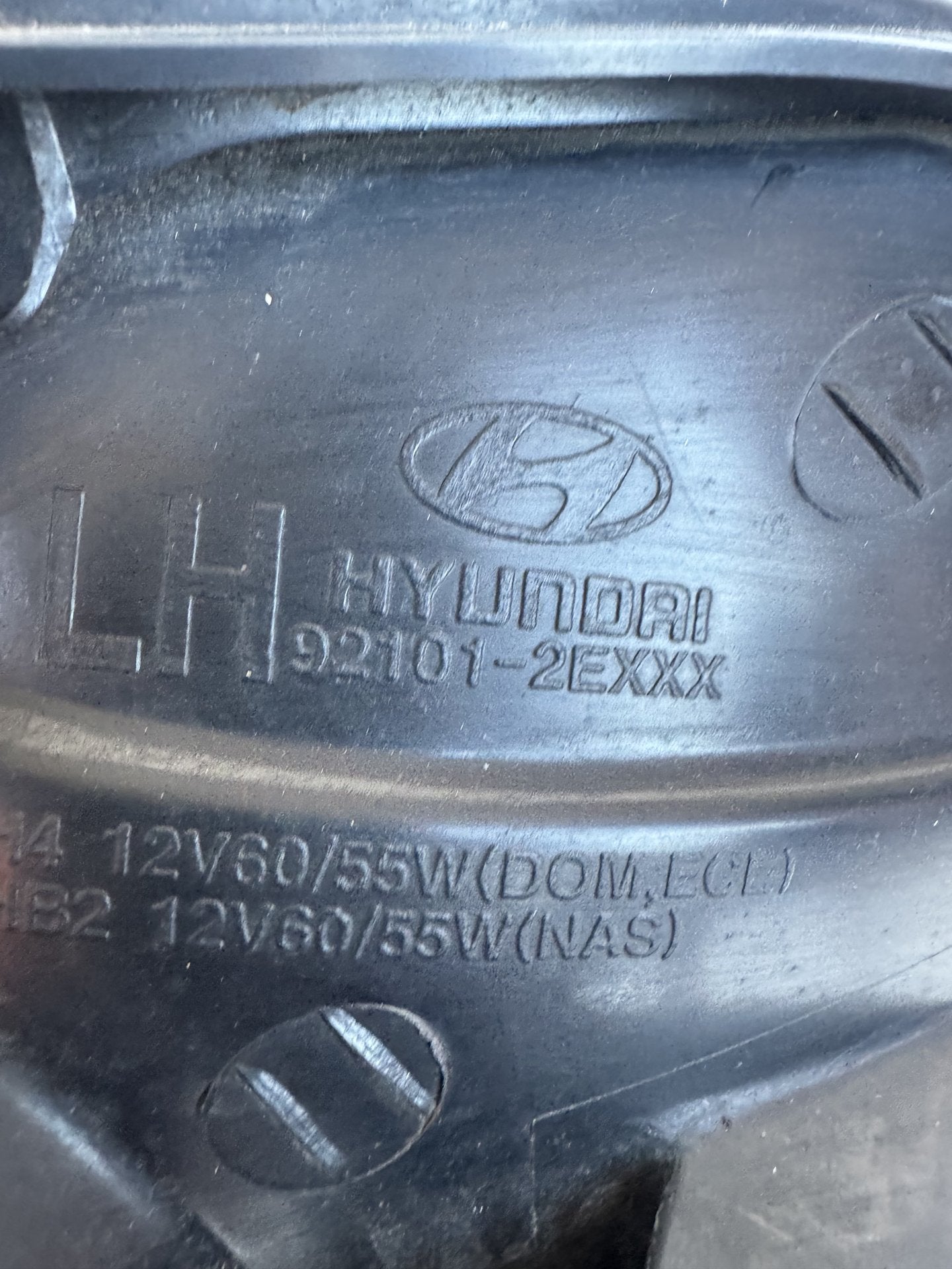 2009  JM Left Headlight