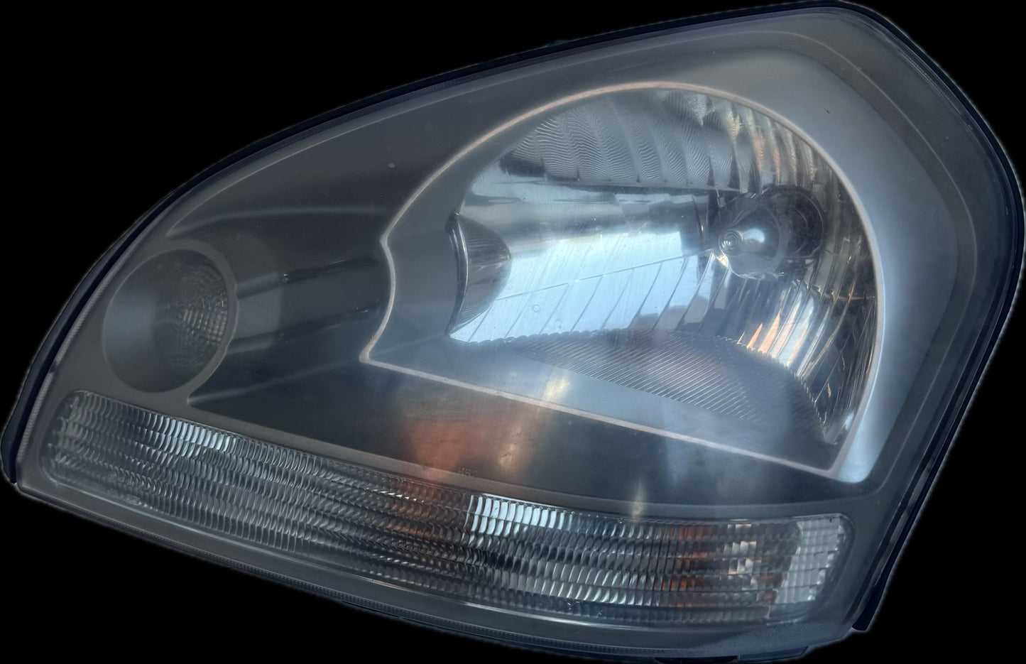 2009  JM Left Headlight