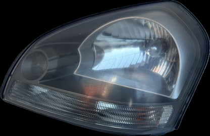 2009  JM Left Headlight