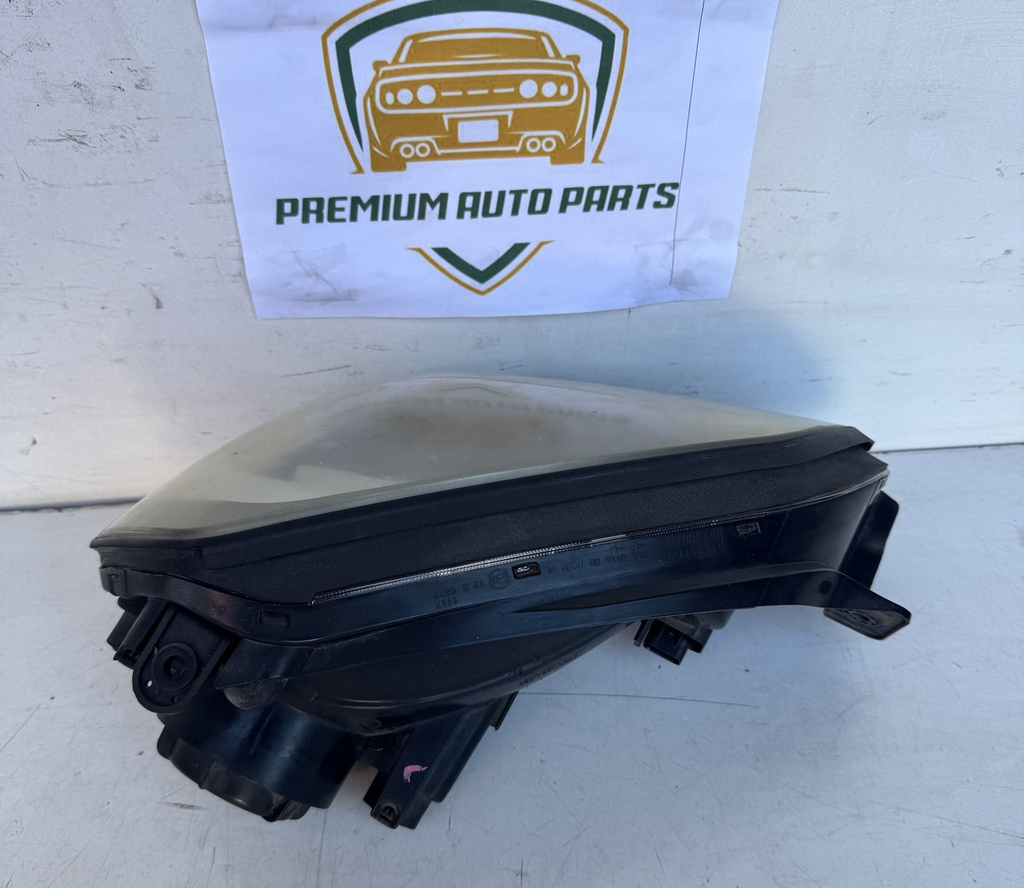 2009  JM Left Headlight